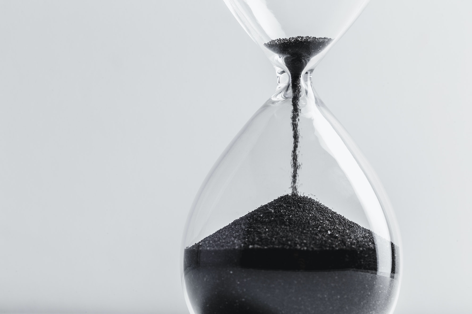 Close up hourglass on table