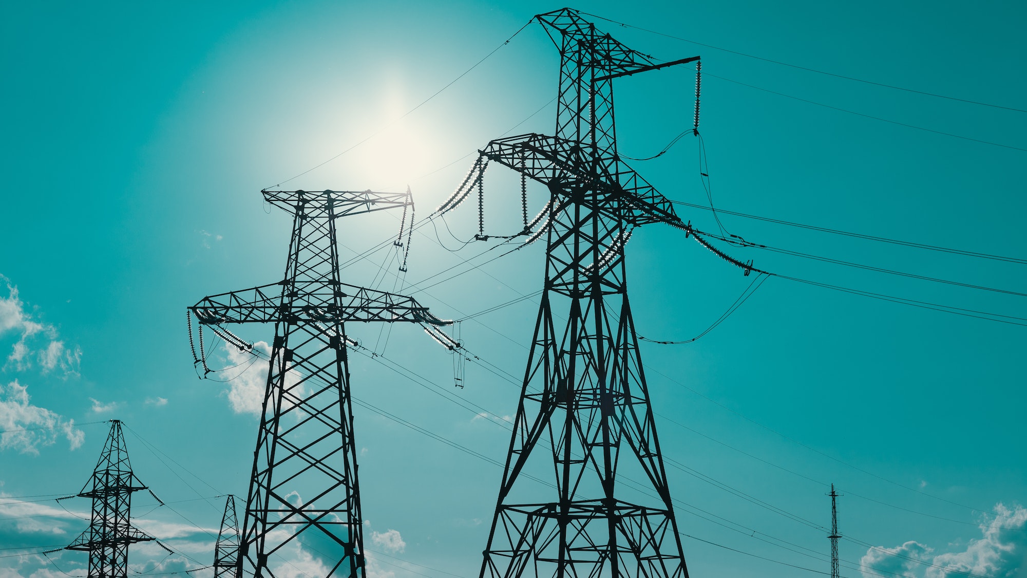 High voltage post. High voltage tower sky background.